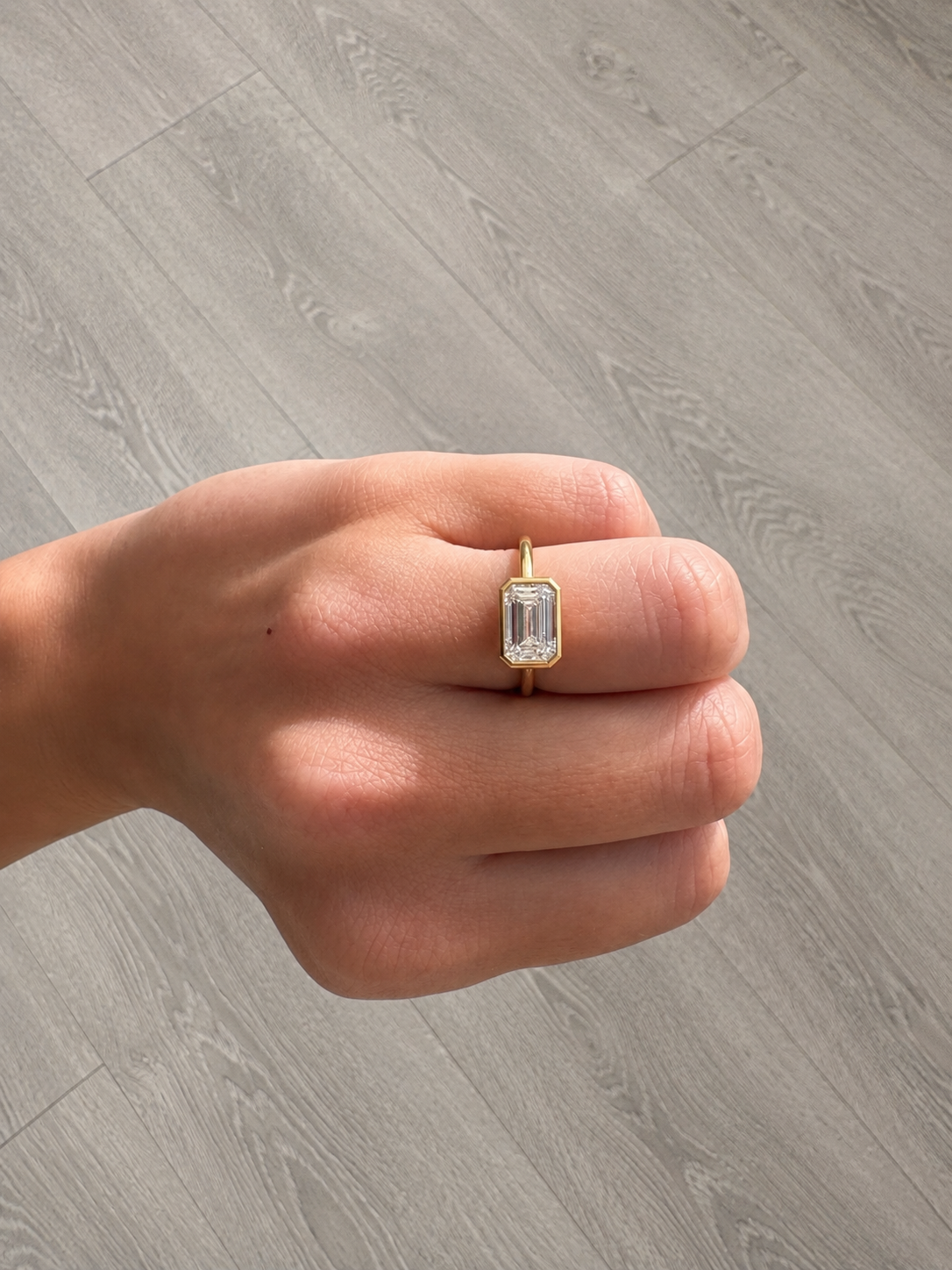 East-West Emerald Cut Lab Diamond Ring