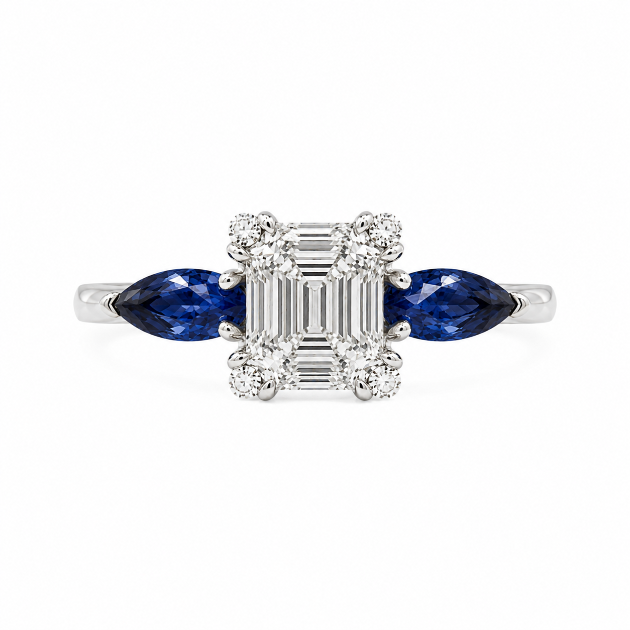 Emerald Cut Diamond & Pear Sapphire Three-Stone Ring