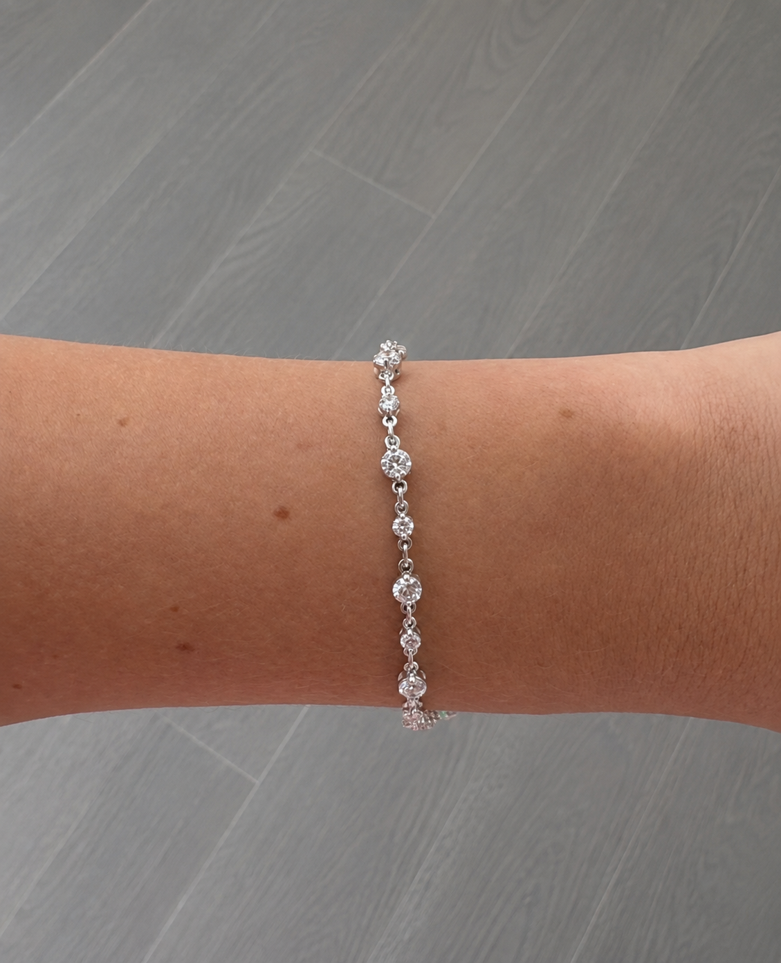 Graduated Round Diamond Station Bracelet