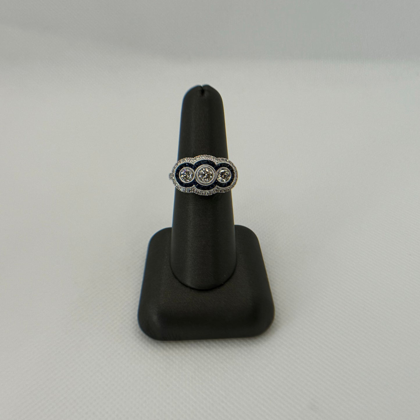 3 Stone Diamond Ring with Sapphire and Diamond Halo